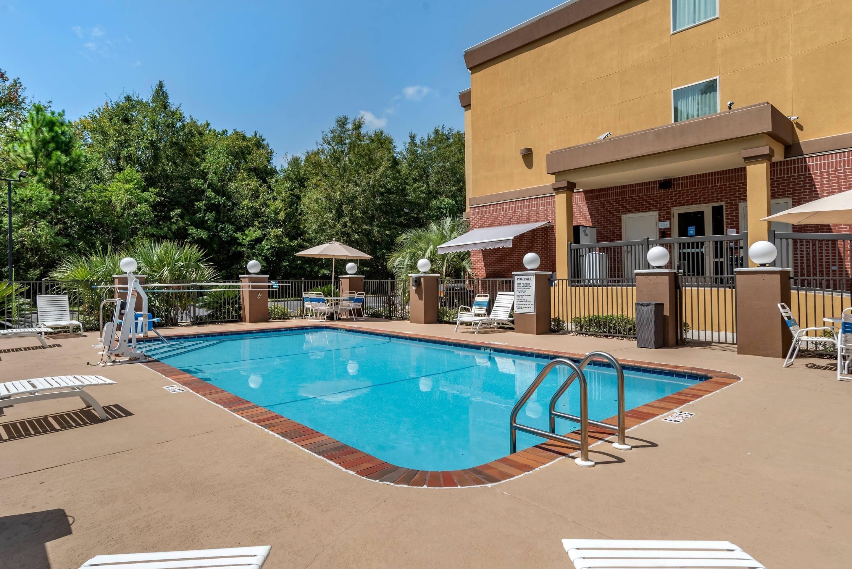 Outdoor pool, open 8:00 AM to 8:00 PM, pool umbrellas, sun loungers