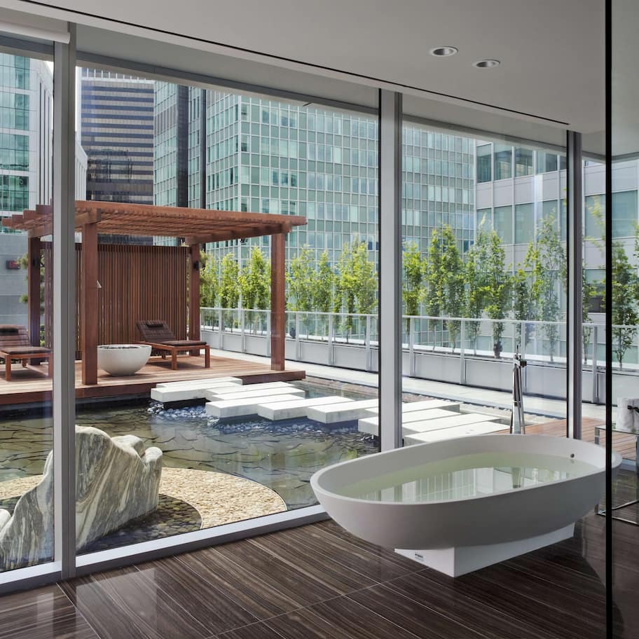 Separate tub and shower, rainfall showerhead, designer toiletries