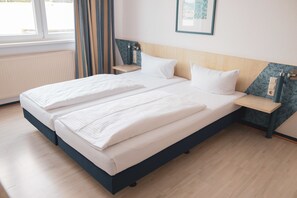 Standard Double or Twin Room | Hypo-allergenic bedding, desk, blackout drapes, iron/ironing board