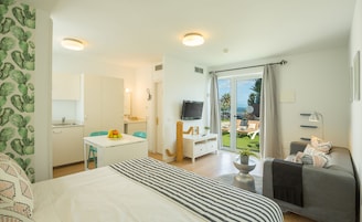 Premium bedding, down duvets, memory-foam beds, in-room safe