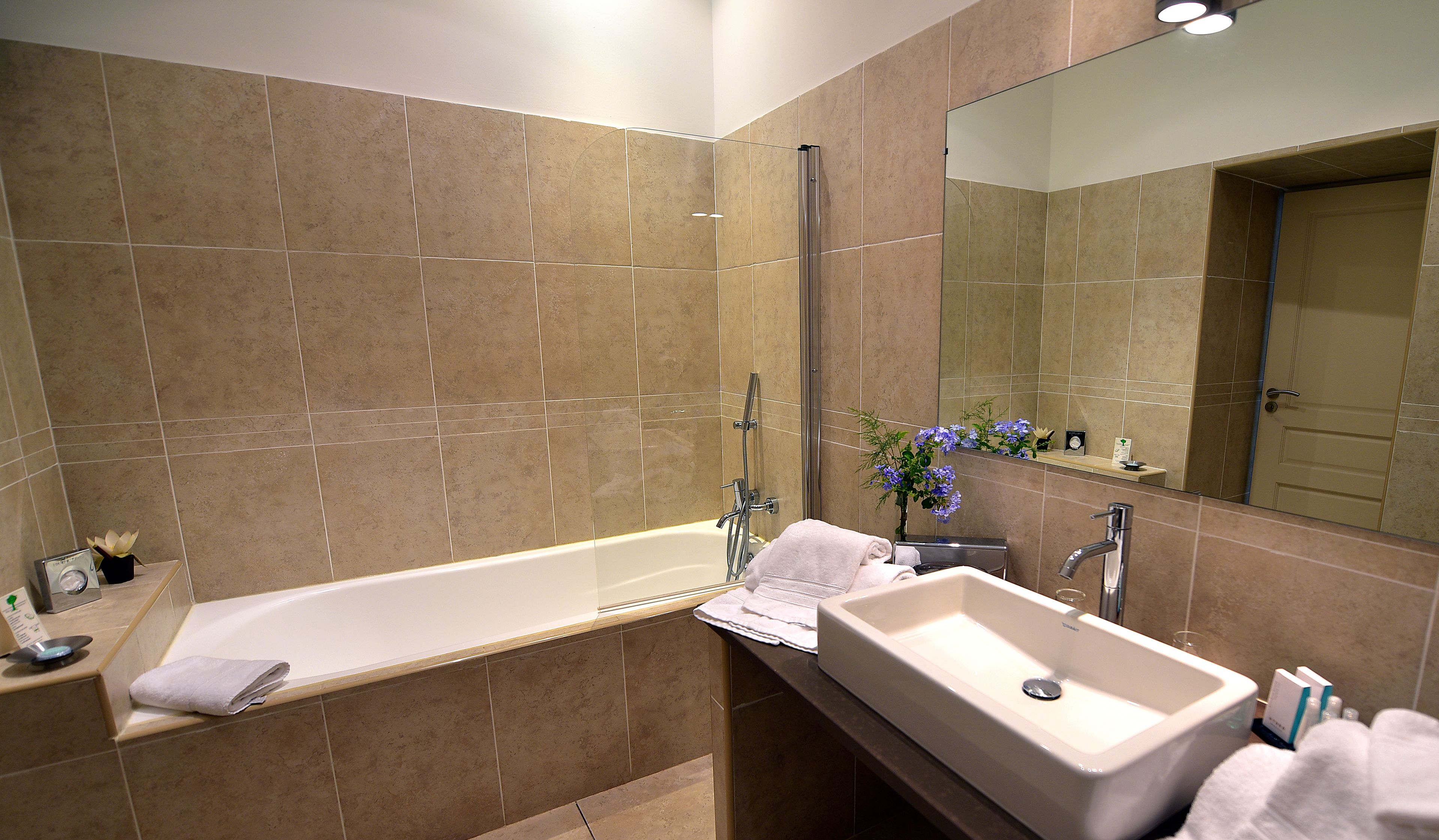 superior junior | bathroom | designer toiletries, hair dryer, bathrobes, slippers