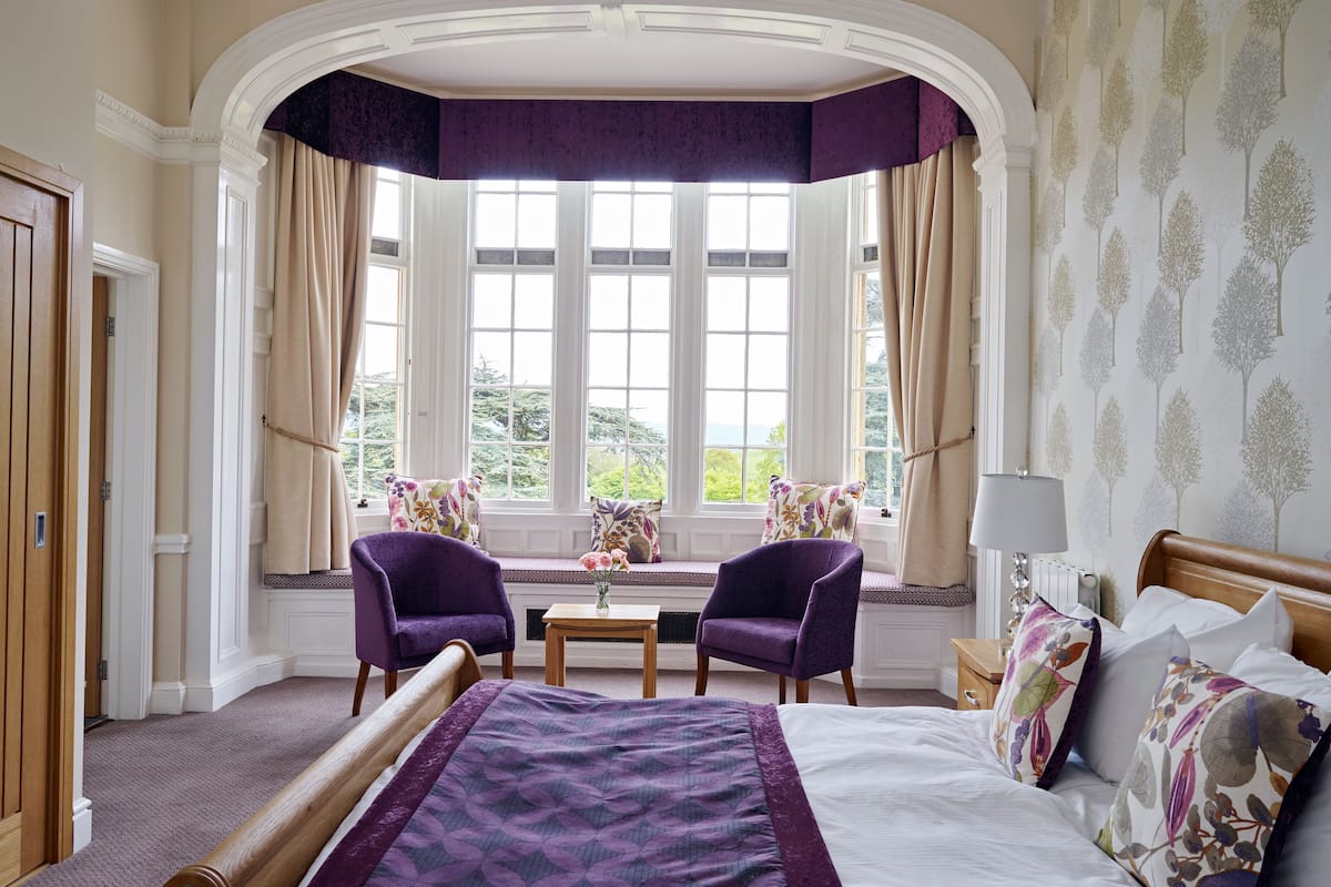 honeymoon suite, 1 king bed, lake view | select comfort beds, desk, iron/ironing board, free wifi