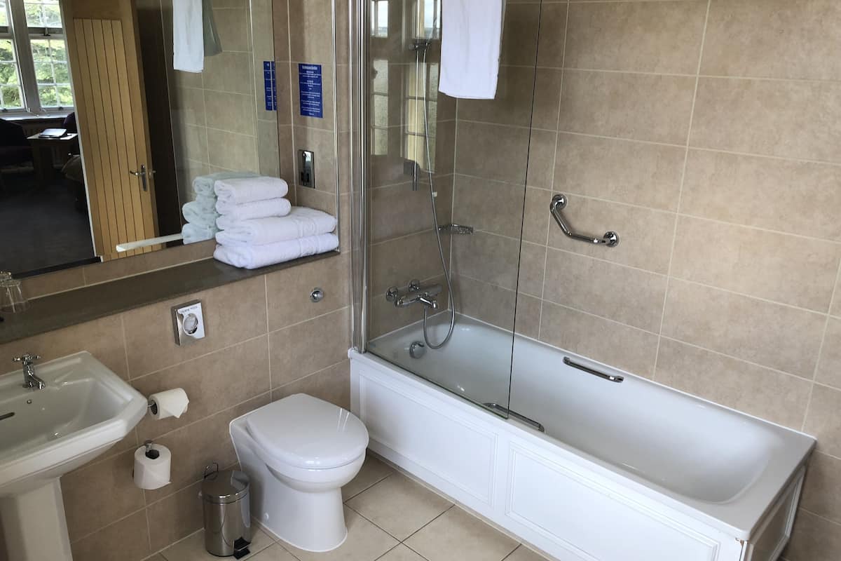 superior quadruple room, multiple beds | bathroom | combined shower/bathtub, free toiletries, hair dryer, towels