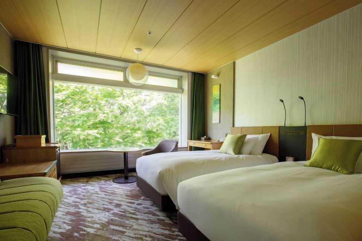 2 Schlafzimmer, Daunenbettdecken, Zimmersafe, Schreibtisch