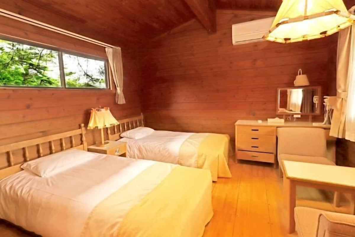 2 Schlafzimmer, Daunenbettdecken, Zimmersafe, Schreibtisch