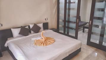 Appartement, 1 chambre | 1 chambre, surmatelas, coffres-forts dans les chambres