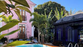Outdoor pool, pool umbrellas, pool loungers