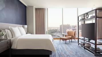 Premium bedding, down comforters, minibar, in-room safe