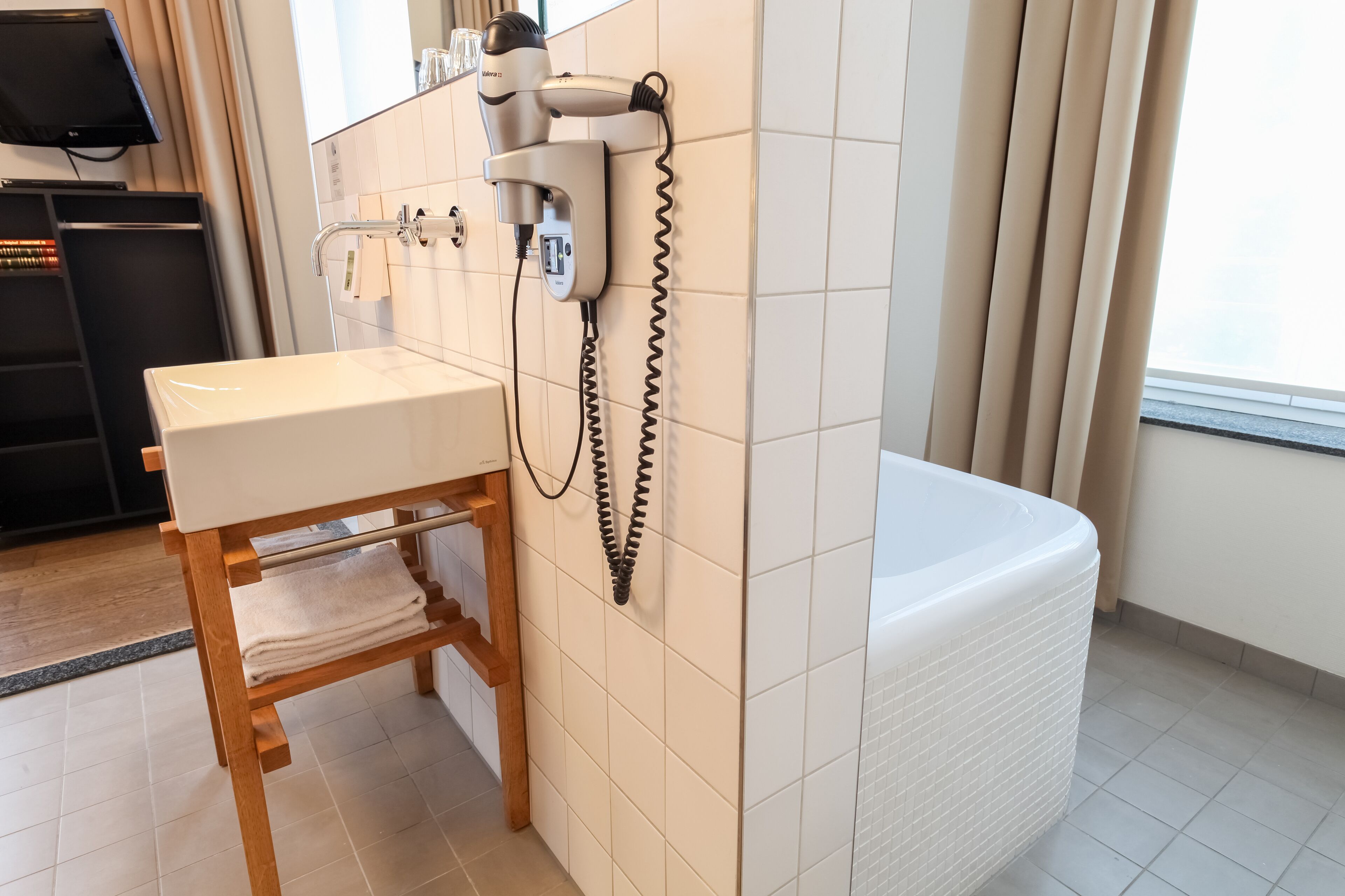 grand room, city view | bathroom | free toiletries, hair dryer, towels