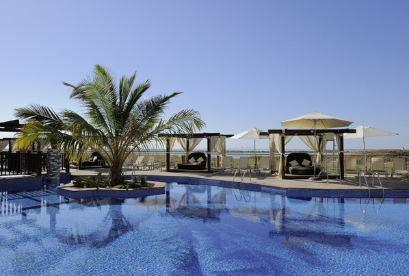 2 outdoor pools, pool umbrellas, pool loungers