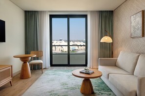 1 Bedroom Suite Plaza View Balcony Theme Park Access | Living area | Flat-screen TV, iPod dock