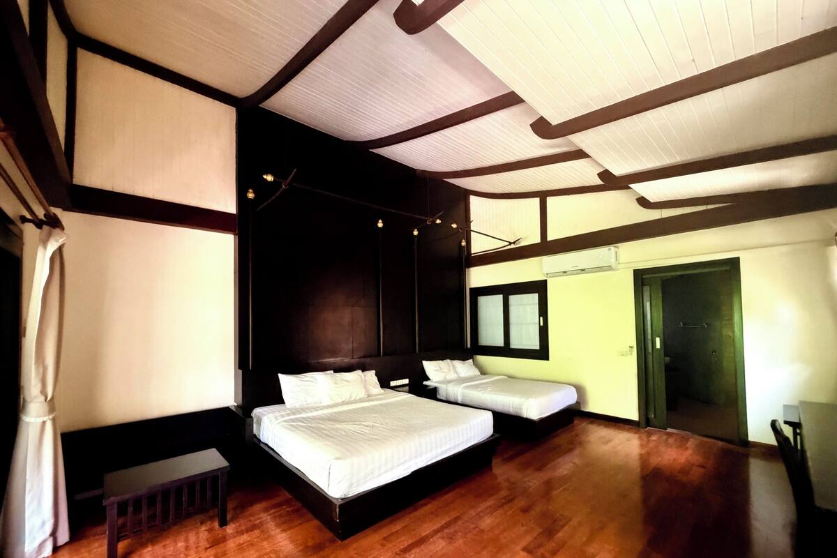 Deluxe Triple Room, Terrace, Garden View | Desk, blackout curtains, iron/ironing board (on request)