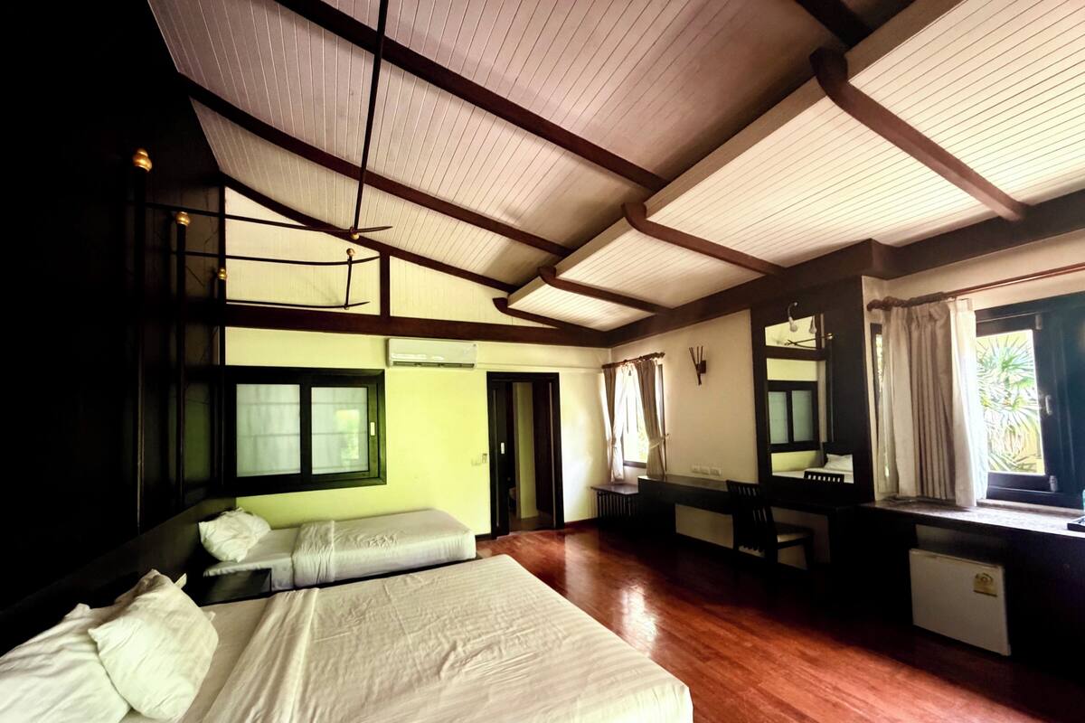 Deluxe Triple Room, Terrace, Garden View | Desk, blackout curtains, iron/ironing board (on request)