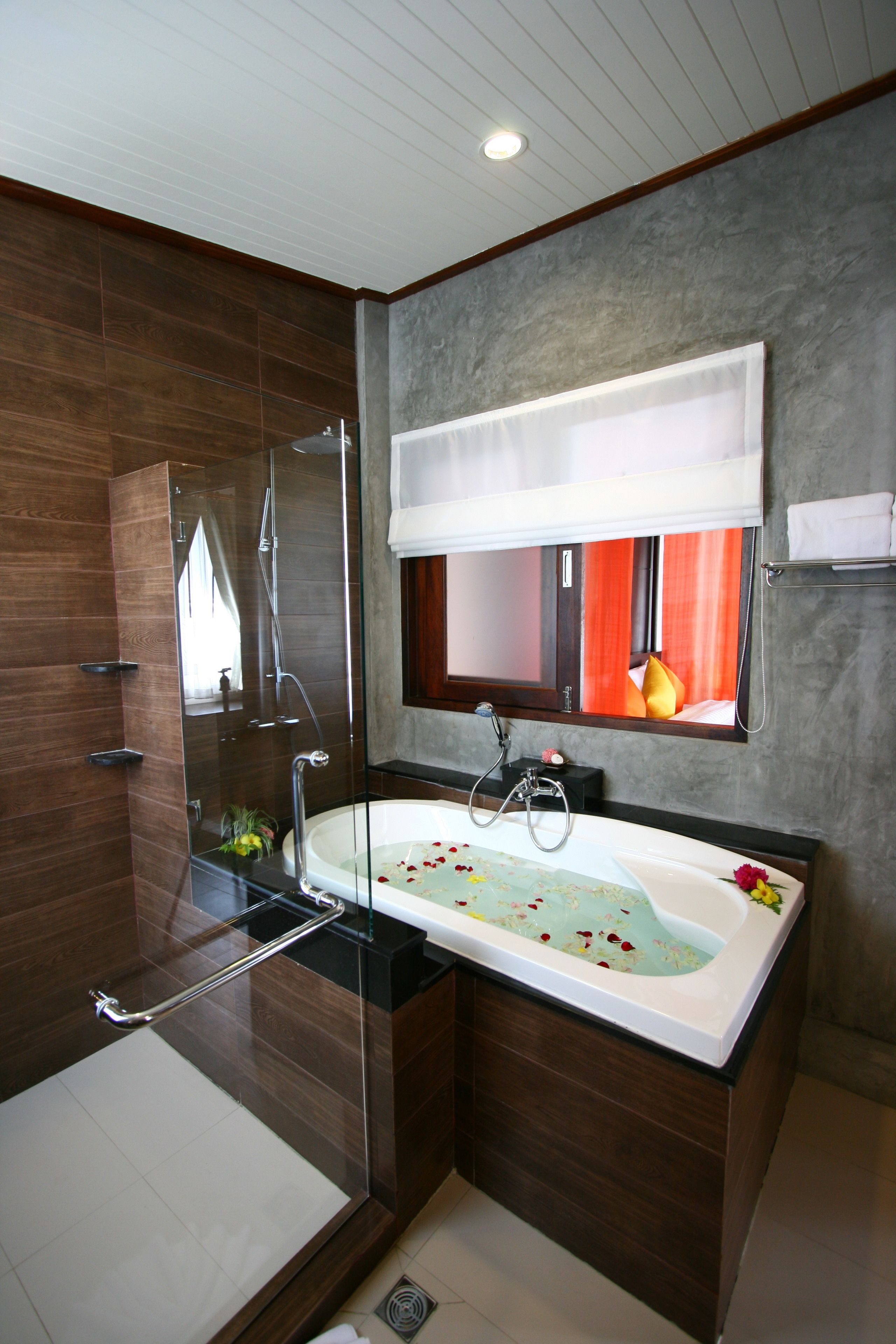 gloriyo hillside villas. | bathroom | separate bathtub and shower, rainfall showerhead, free toiletries