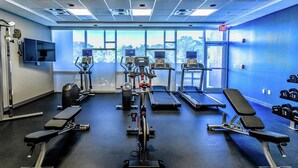 A gym with treadmills, stationary bikes, and weight benches. - Hampton Inn & Suites Sarasota/Bradenton-Airport, FL (Sarasota)