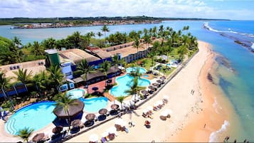 On the beach, sun loungers, beach umbrellas, beach towels