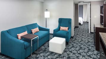 Junior Suite, 1 King Bed | Living area | 32-inch LCD TV with premium channels, TV, MP3 dock