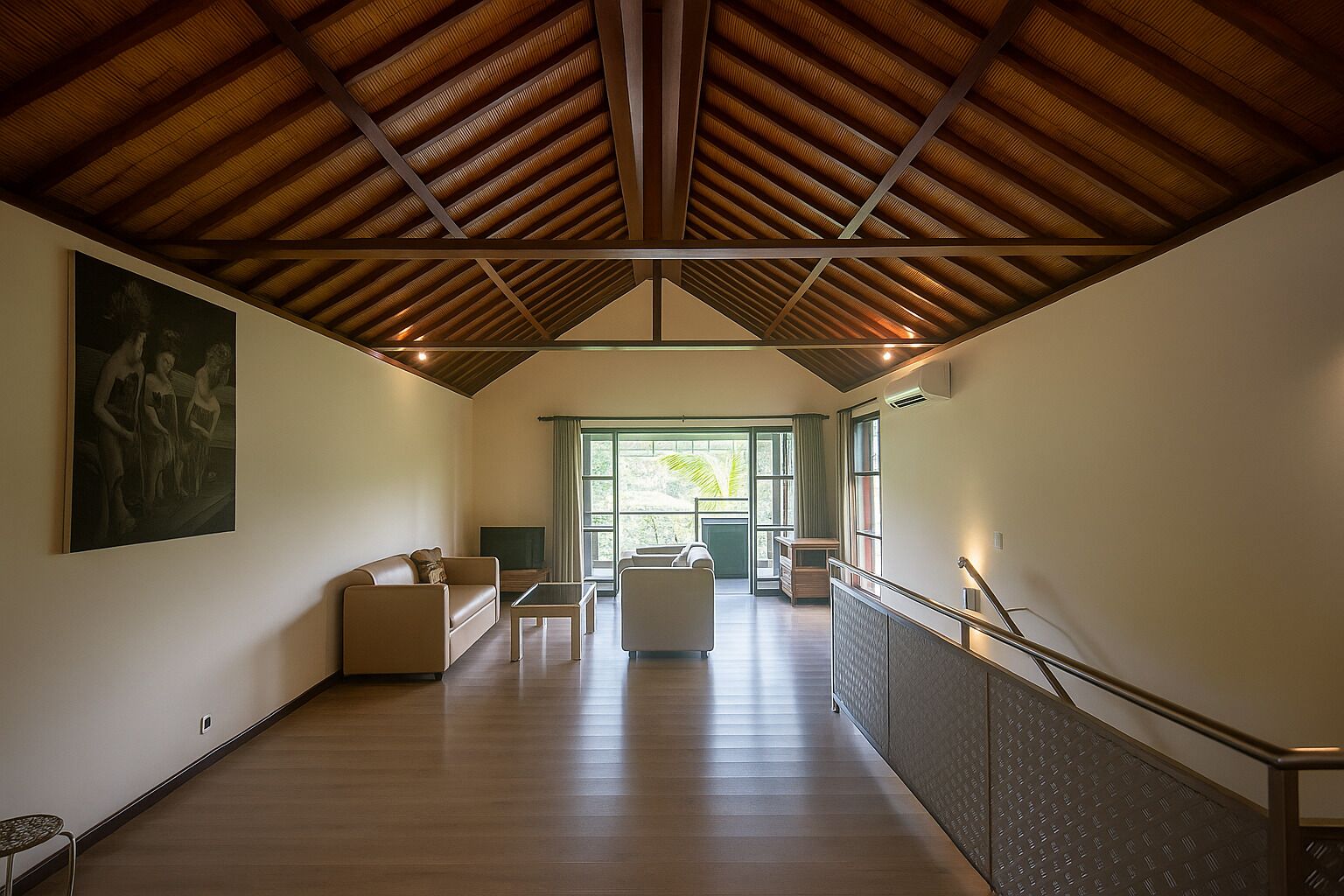 A spacious hallway with a high ceiling, a staircase, and a view of the outdoors.
