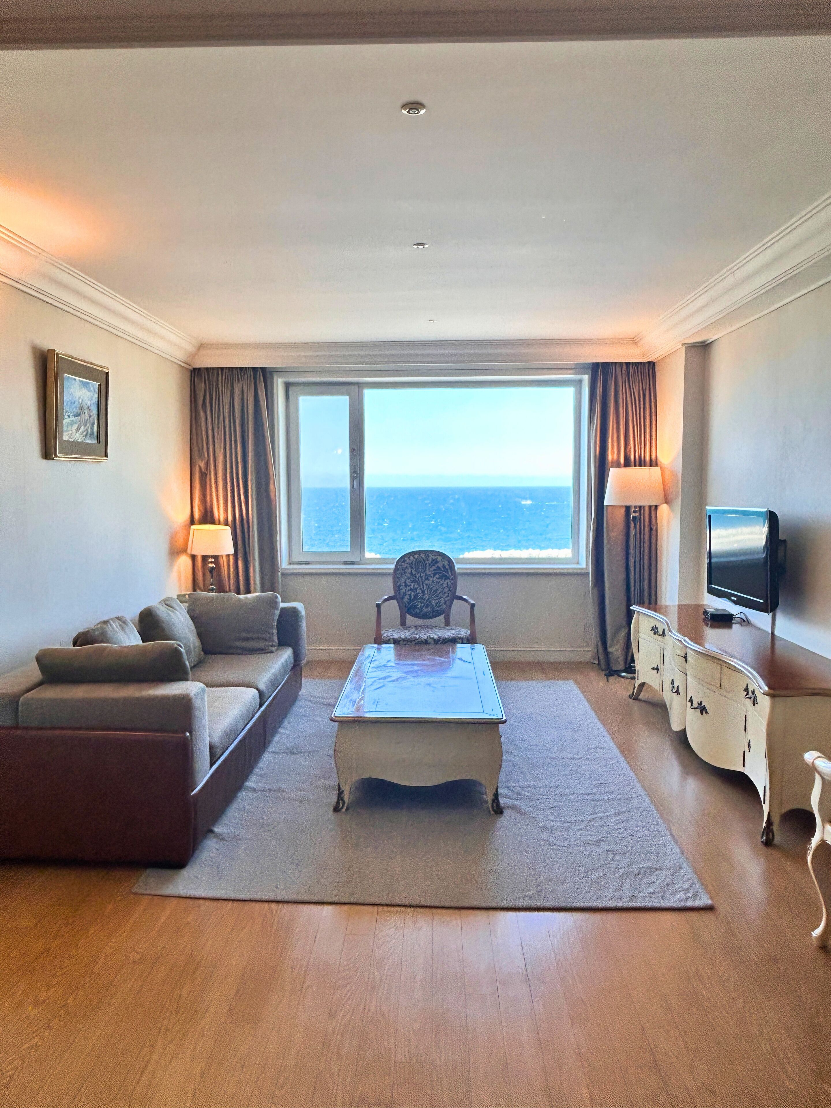 junior ocean suite | living area | lcd tv