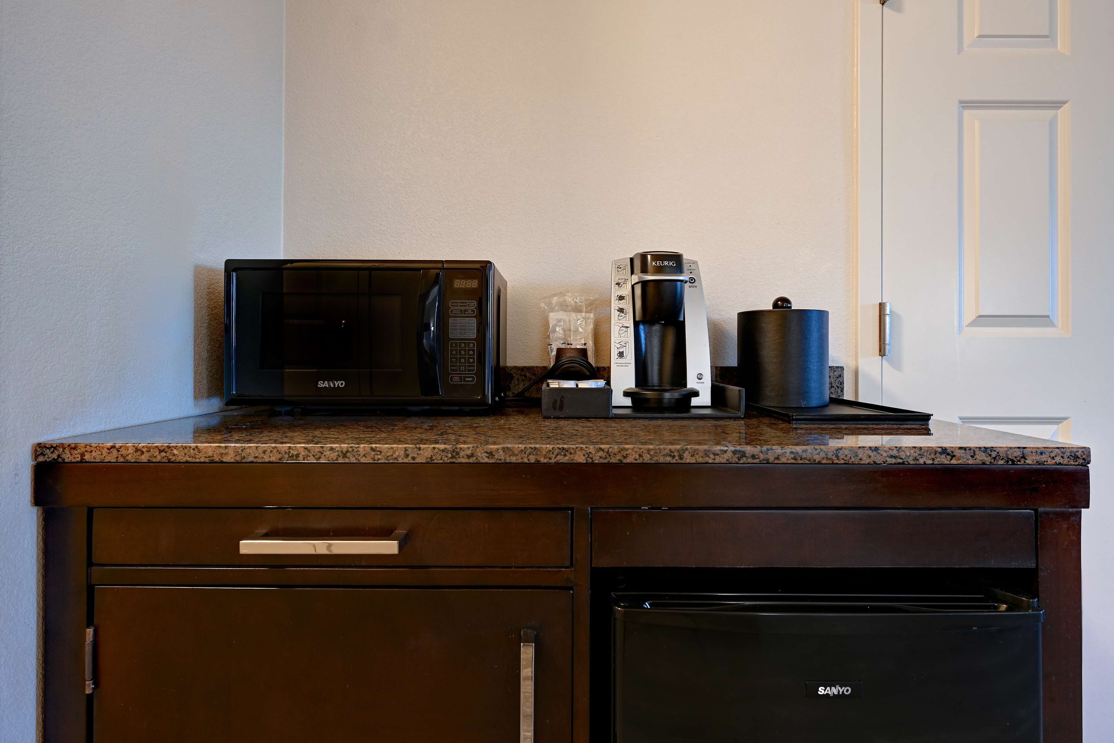 premium bedding, desk, blackout curtains, iron/ironing board