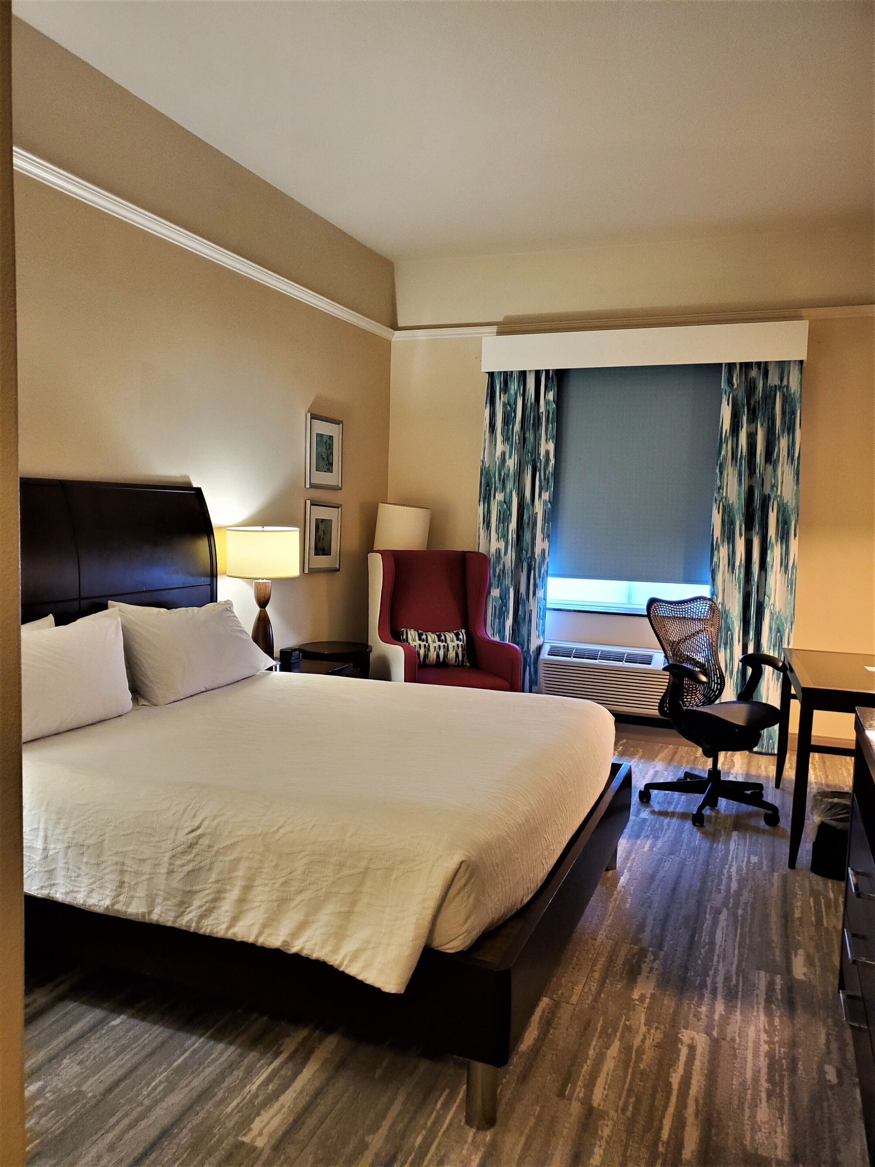 one king evolution room | premium bedding, desk, blackout curtains, iron/ironing board