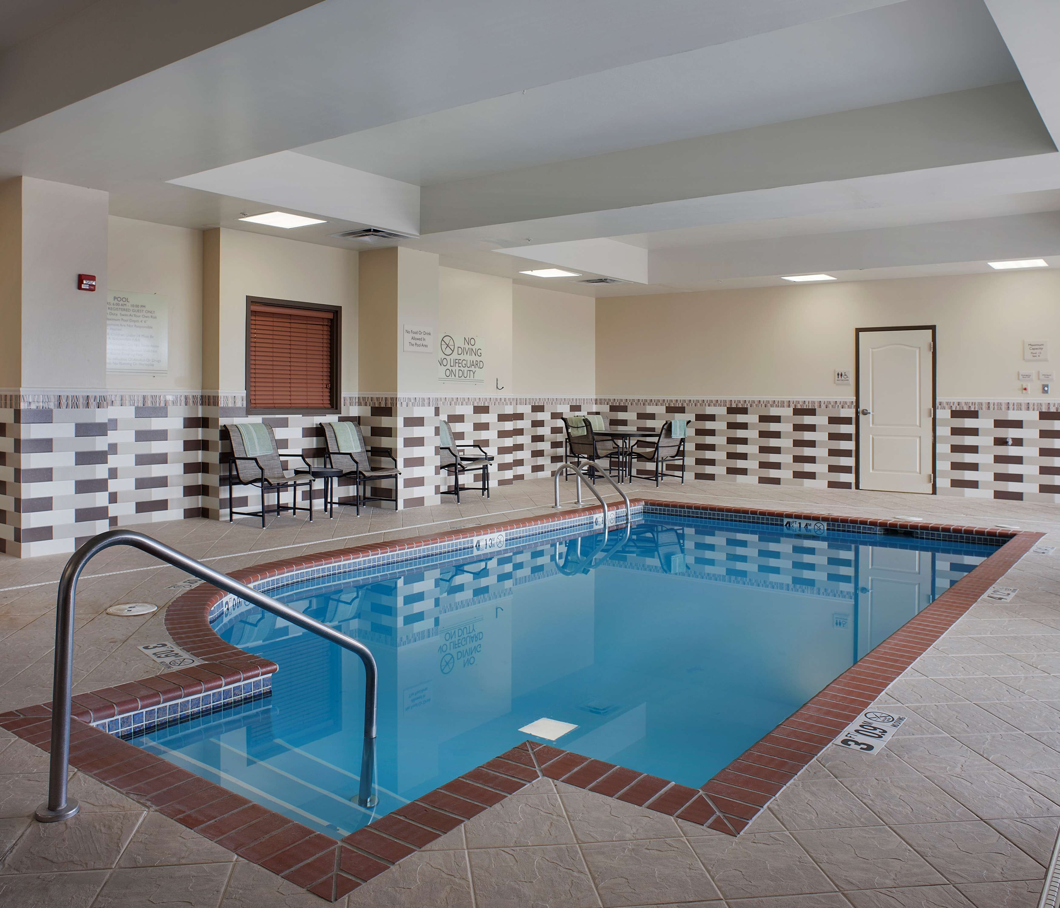 indoor pool, open 7 am to 10 pm, pool loungers