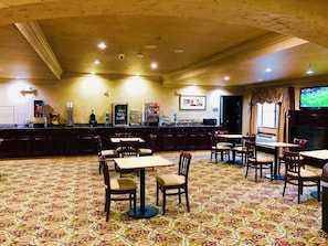 Enjoy meals in the dining area with a coffee machine and TV.