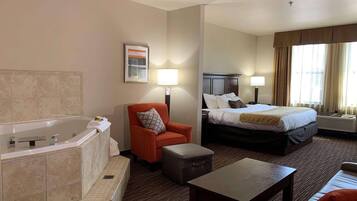 Suite, 1 King Bed, Non Smoking, Jetted Tub | 1 bedroom, blackout drapes, iron/ironing board, free cribs/infant beds