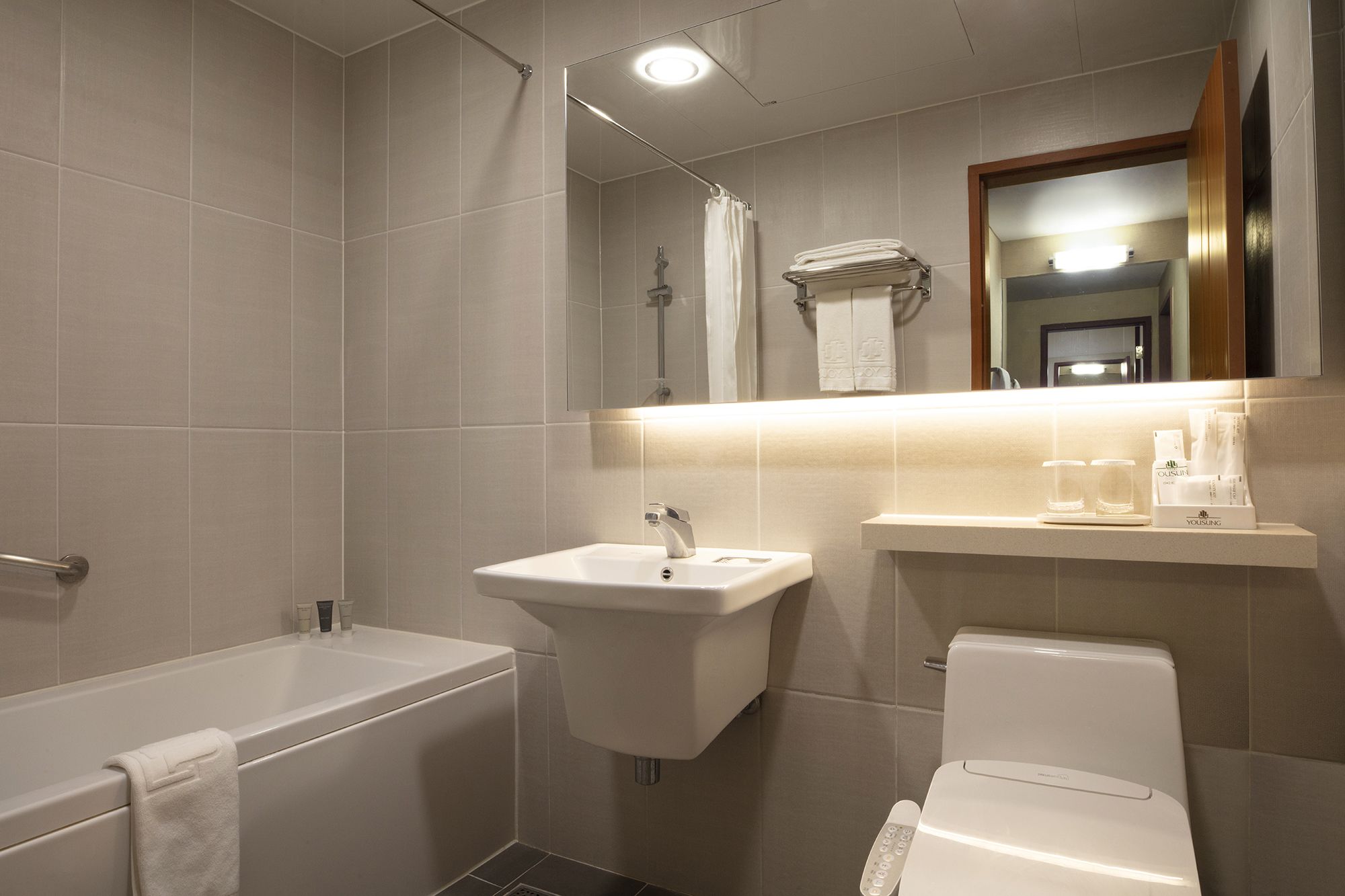 combined shower/bathtub, free toiletries, hair dryer, dressing gowns