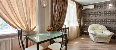 Standard Apartment | Living area | Plasma TV, DVD player