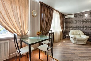 Standard Apartment | Living area | Plasma TV, DVD player