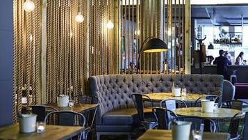 Breakfast, lunch, dinner served; international cuisine