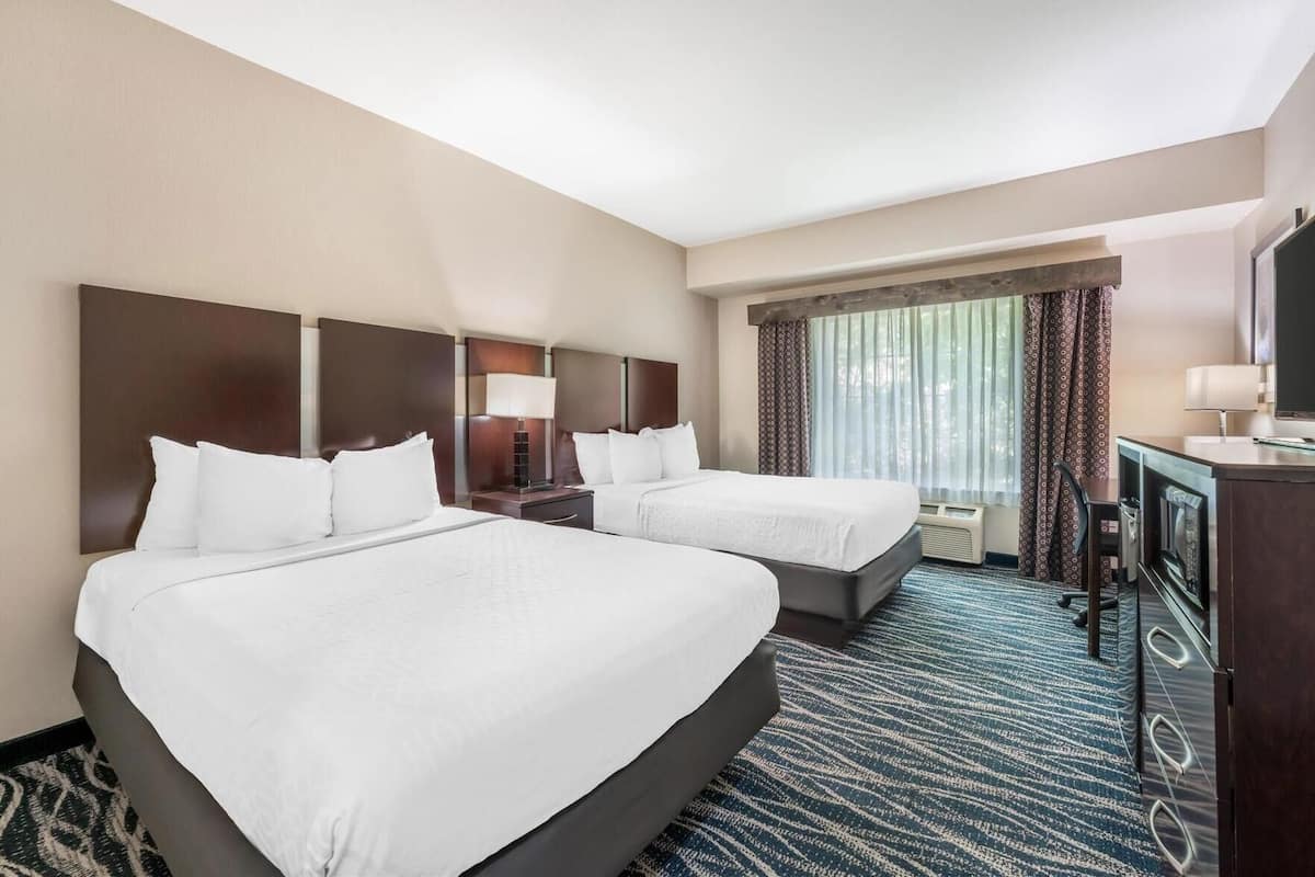 Premium bedding, pillowtop beds, desk, blackout drapes