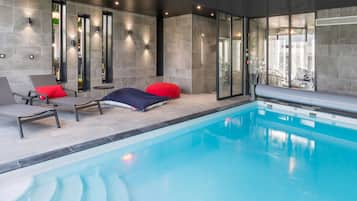Indoor pool, open 8:00 AM to 10:00 PM, pool loungers