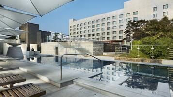 Seasonal outdoor pool, open 1:30 PM to 8:00 PM, cabanas (surcharge)
