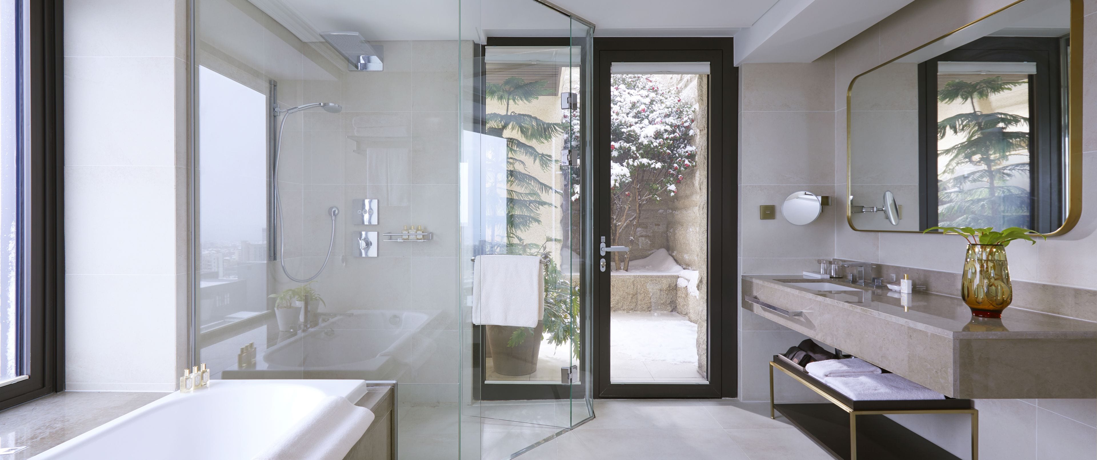 designer toiletries, hair dryer, bathrobes, slippers