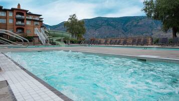 Seasonal outdoor pool, open 9:00 AM to 10:00 PM, pool umbrellas
