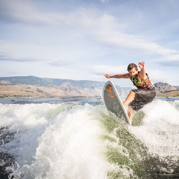 A person surfing on a wave.