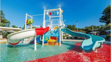Indoor pool, outdoor pool, pool umbrellas