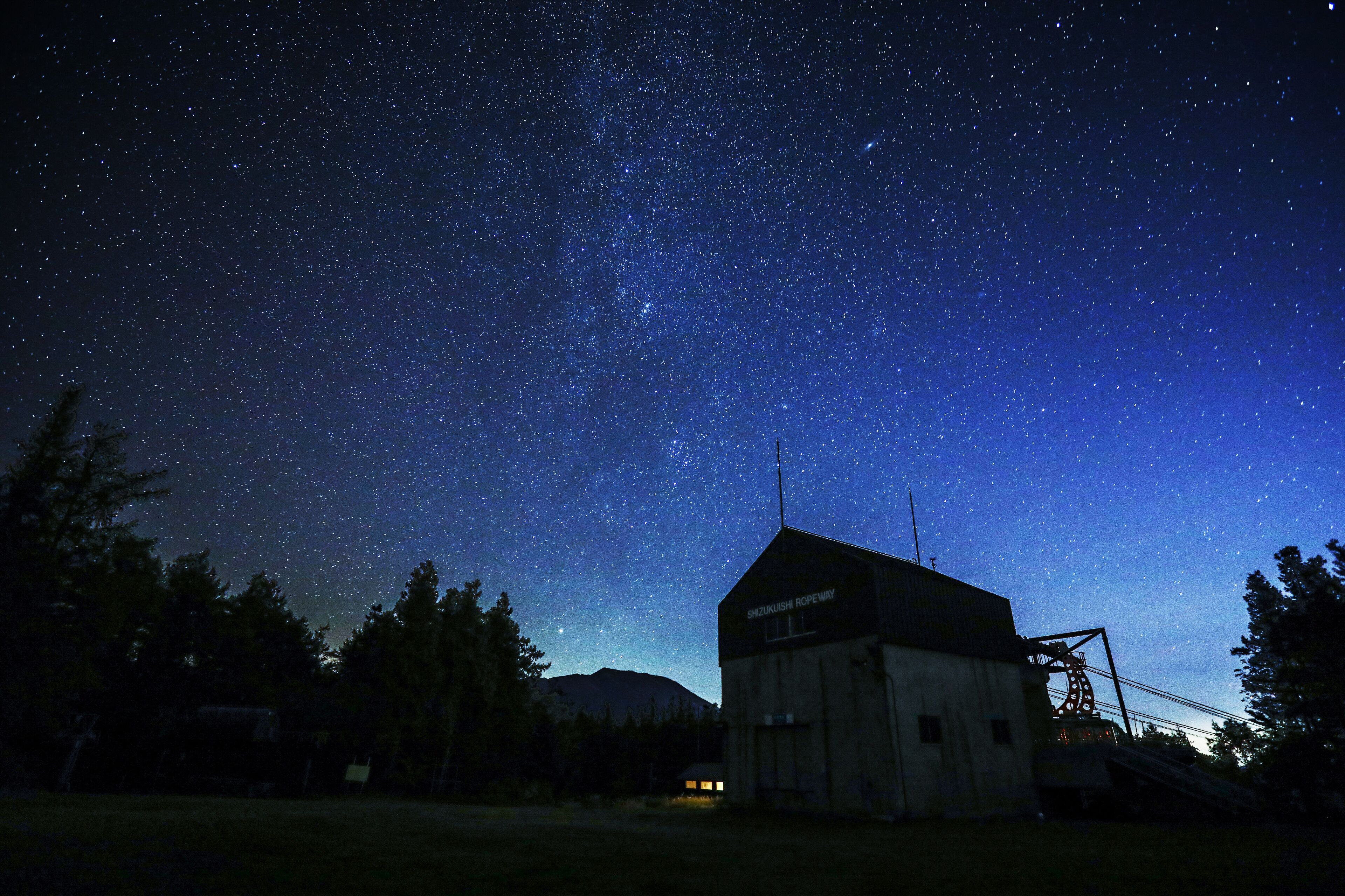 A starry night sky over a rural area with a building labeled "Shiloh Ropeway."