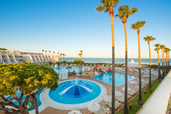 Seasonal outdoor pool, pool umbrellas, sun loungers