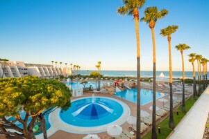 Seasonal outdoor pool, pool umbrellas, sun loungers