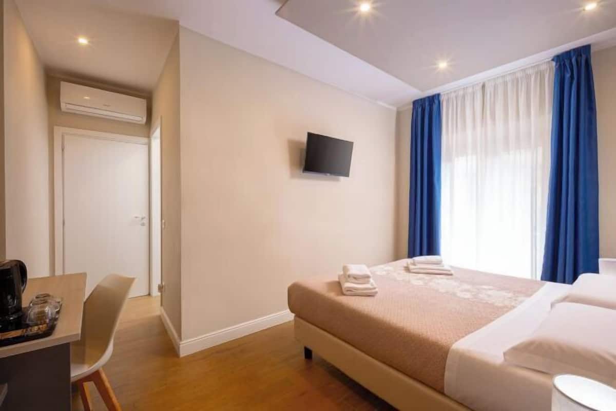 Minibar, desk, cribs (free), rollaway beds (surcharge)