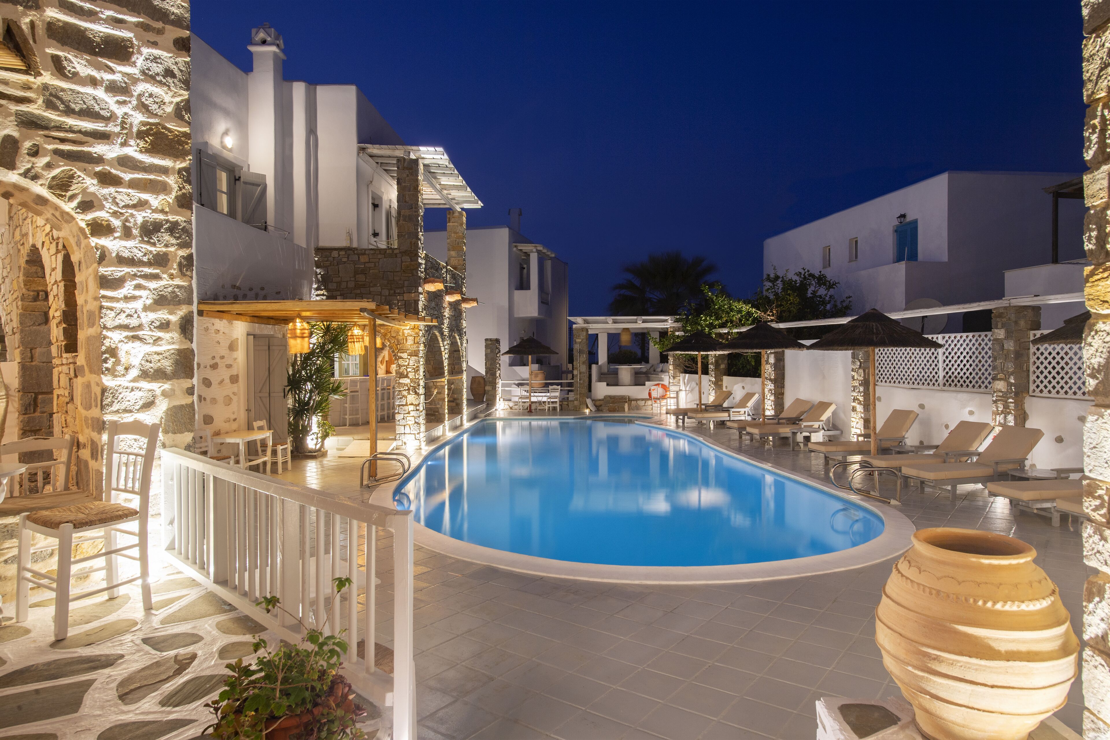 Outdoor pool, pool umbrellas, sun loungers