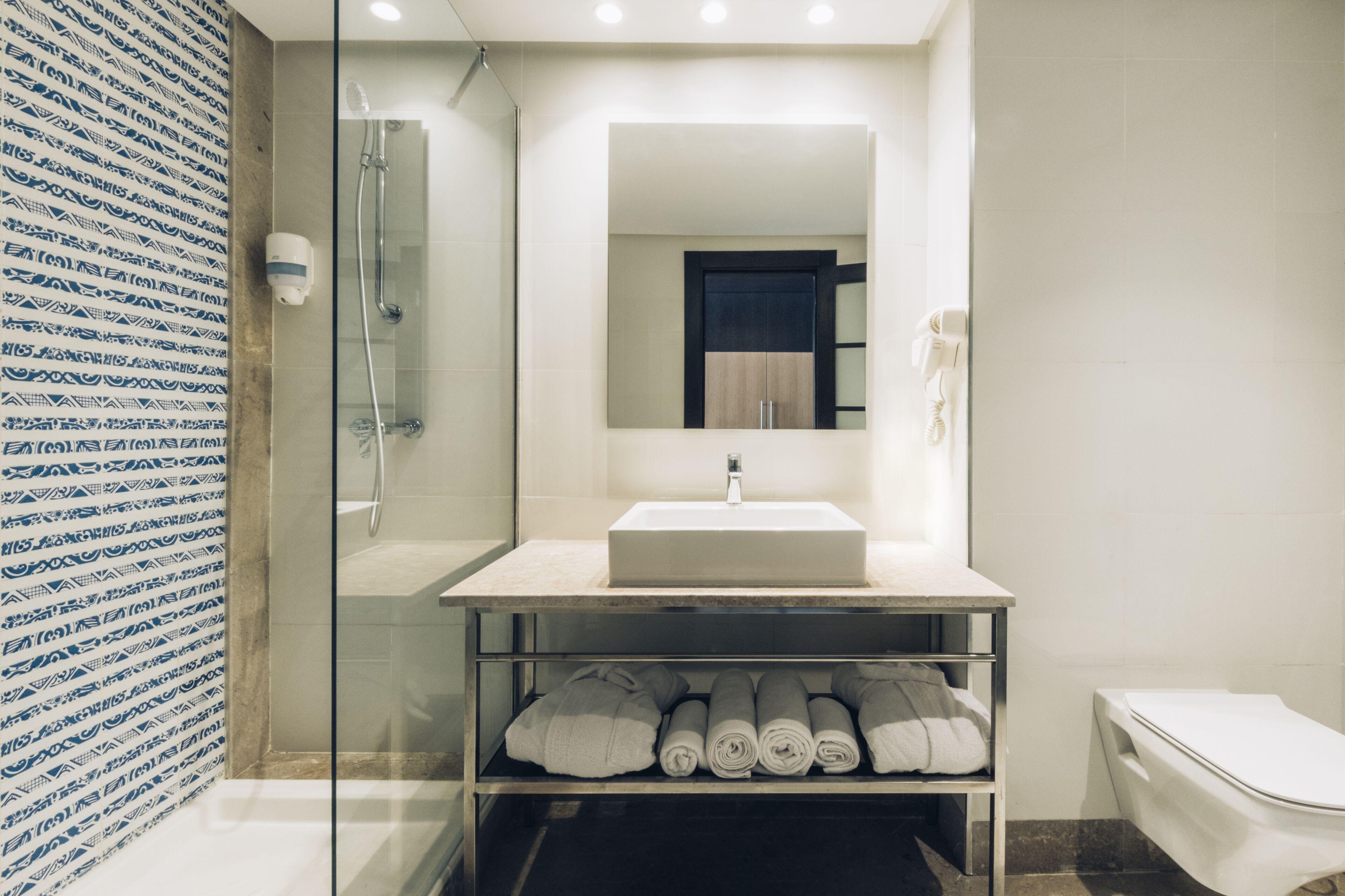 shower, eco-friendly toiletries, hair dryer, bathrobes