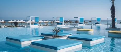 Indoor pool, 2 outdoor pools, pool umbrellas, sun loungers