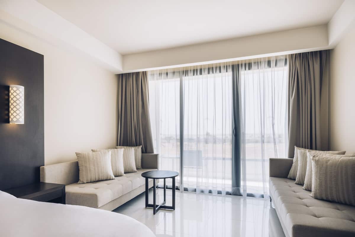 family room, garden view (2 adults & 2 children) | 1 bedroom, minibar, in-room safe, individually decorated