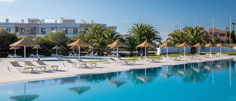 3 outdoor pools, open 8:00 AM to 8:00 PM, pool umbrellas, sun loungers