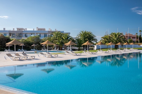 3 outdoor pools, open 8:00 AM to 8:00 PM, pool umbrellas, sun loungers