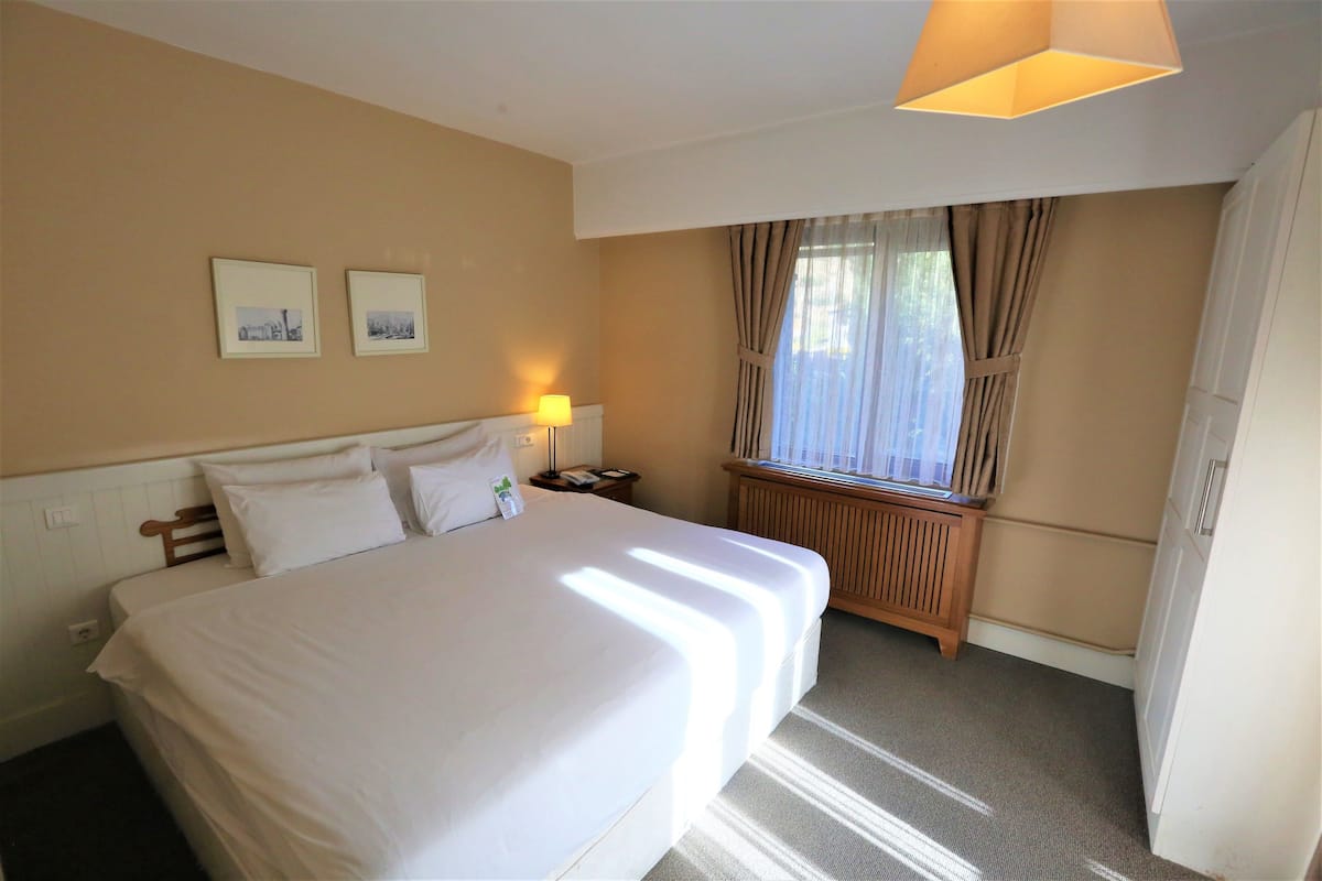 Junior suite, 1 tweepersoonsbed | 1 slaapkamer, luxe beddengoed, een minibar, een kluis op de kamer